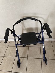 Blue/Black 4-Wheel Rollator Walker, Adjustable Handles, Handbrakes, Padded Seat