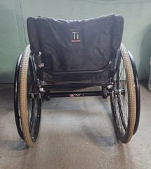 TIlite TRA Titanium wheelchair . 16″ wide x 16″ deep seat.
